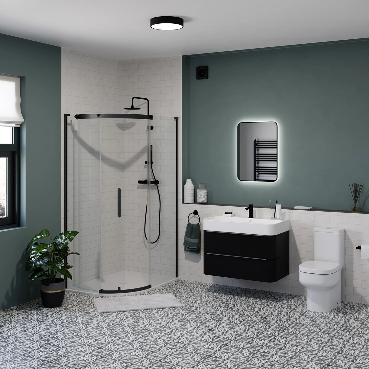 Modern bathroom interior featuring a black floating vanity with a white sink, an illuminated rectangular mirror, a glass shower enclosure, a white toilet, patterned black-and-white floor tiles, and dark green walls. #Finish_Black