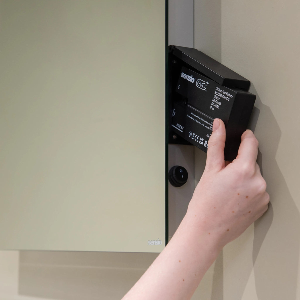 Lustro battery operated LED mirror lit on a bathroom wall