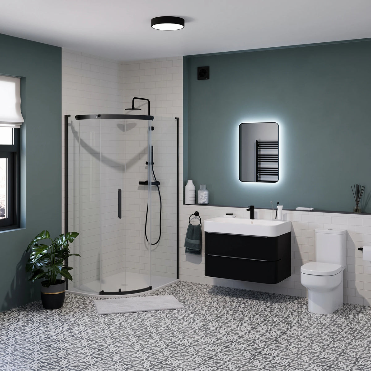 Modern bathroom interior featuring a black-framed glass shower enclosure, white floating vanity with sink, black toilet, patterned gray-and-white floor, and a green accent wall with an illuminated mirror. #Finish_Black